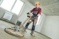 Floor machine grinding by power trowel Royalty Free Stock Photo