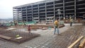 Floor slab and beam reinforcement bar under fabrication at the construction site by workers.