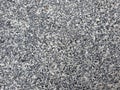 Floor of small stone mixed with concrete texture background