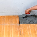 Floor tile installation for house building Royalty Free Stock Photo