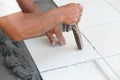 Floor tile installation for house building Royalty Free Stock Photo