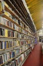 Floor to Ceiling Shelves Loaded with Books