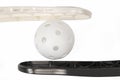 Floorball stick and white ball Royalty Free Stock Photo