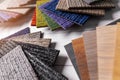 Flooring and furniture materials - floor carpet and wooden laminate samples Royalty Free Stock Photo