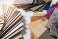 Flooring and furniture materials - floor carpet and wooden laminate samples Royalty Free Stock Photo
