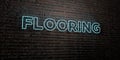 FLOORING -Realistic Neon Sign on Brick Wall background - 3D rendered royalty free stock image Royalty Free Stock Photo