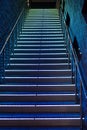 Between the floors staircase with illuminated steps Royalty Free Stock Photo