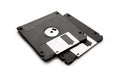 Floppy disk from black plastic isolated on white background. Outdated technology. Data storage diskette Royalty Free Stock Photo