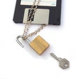 Floppy disk with chain, padlock and key. Royalty Free Stock Photo