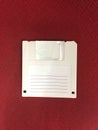 Floppy disk on red background Royalty Free Stock Photo