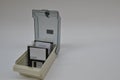 Box or file, for storing floppy disks, box with keys, with floppy disks, open lid, white background and copy space