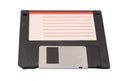 Floppy disk used to save computer data in the 90s on a white background