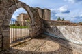 Flor da Rosa Monastery in Crato seen through the gothic gate. Royalty Free Stock Photo