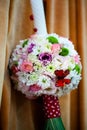 Floral arrangement on a baptismal candle Royalty Free Stock Photo