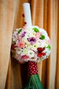 Floral arrangement on a baptismal candle Royalty Free Stock Photo