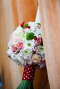 Floral arrangement on a baptismal candle Royalty Free Stock Photo