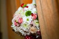 Floral arrangement on a baptismal candle