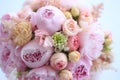 Floral arrangement of fresh pink peonies, astilba, rose and carnation. The brides bouquet.