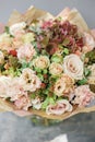 Floral Arrangement. Mix flowers. Beautiful summer bouquet. Concept of a flower shop. Profession florist Royalty Free Stock Photo