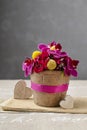 Floral arrangement with orchid and craspedia flowers Royalty Free Stock Photo