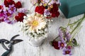 Floral arrangement with peach gerbera flower and gypsophila paniculata