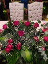 Floral Arrangement of Roses, Baby& x27;s Breath and Green Leaves in Wedding