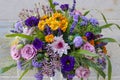 Floral arrangement with roses, chrysanthemums and eustoma