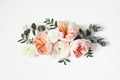 Floral arrangement, web banner with pink English roses, ranunculus, carnation flowers and green leaves on white table Royalty Free Stock Photo