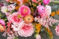 Floral backdrop, background. Orange pink bouquet with roses close-up, details Royalty Free Stock Photo