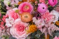 Floral backdrop, background. Flowers in bloom. Orange pink bouquet with roses close-up Royalty Free Stock Photo