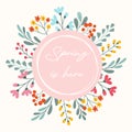 Floral background with text Spring is here, tender flowers, plants branches Royalty Free Stock Photo