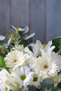 Floral background with white gerbera flowers, chrysanthemums and lilies Royalty Free Stock Photo