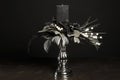 Floral bouquet with a gray candle to decorate the holidays using dried flowers