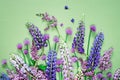 Floral composition, fresh flowers on the green table