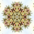 Floral design into a kaleidoscopic shape with multiple types of flowers for a design