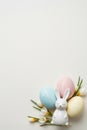 A floral and egg composition on a pastel blue background Easter Royalty Free Stock Photo