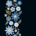 Floral embroidery. Vertical seamless line with beautiful blue flowers on black background. Royalty Free Stock Photo