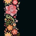 Floral embroidery. Vertical seamless line with pretty flowers on black background. Romantic template Royalty Free Stock Photo