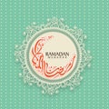 Floral frame with Arabic text for Ramadan Mubarak. Royalty Free Stock Photo