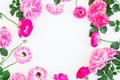 Floral frame made of pink roses, peonies and leaves on white background. Flat lay, top view. Floral lifestyle composition. Royalty Free Stock Photo