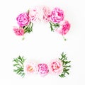 Floral frame made of rink roses and green leaves on white background. Flat lay, top view. Flower background Royalty Free Stock Photo