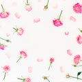 Floral frame of made roses buds and petals on white background. Flat lay, Top view. Roses flowers texture. Valentines day Royalty Free Stock Photo