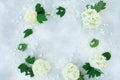 Floral frame made of white hydrangea on gray background. Flat lay Royalty Free Stock Photo
