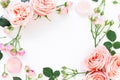 Floral frame of peony roses, buds and leaves on white background. Flat lay, top view. Floral background.