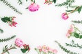 Frame with pink peonies, roses and eucalyptus isolated on white background. Flat lay, top view Royalty Free Stock Photo