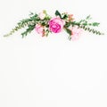 Floral frame of pink peonies and roses flowers and eucalyptus on white background. Flat lay, top view Royalty Free Stock Photo