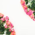 Floral frame of pink roses bouquets on white background. Flat lay, top view