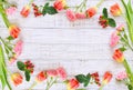 Floral frame with spring flowers and butterflies Royalty Free Stock Photo