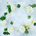 Floral frame of white hydrangea and yellow iris on gray background. Flat lay Royalty Free Stock Photo