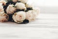 Floral greeting card mockup. White roses on wooden background, s Royalty Free Stock Photo